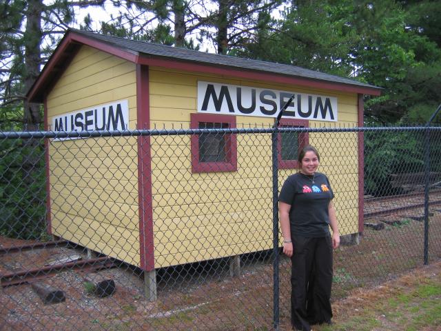 Hannah in front of the Logging Museum